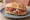 Panino con Capocollo di Norcia: an illustration of pork and capicola on kaiser roll.