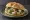 Panino con Cappon Magro: an illustration of fish and salsa verde on kaiser roll.