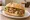 Panino con Cassoeula: an illustration of pork and cabbage on kaiser roll.