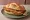 Panino con Cotoletta: an illustration of veal, chicken, egg, butter and more on kaiser roll.