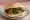 Panino con Friarielli: an illustration of pork, broccoli rabe, garlic and pepper on kaiser roll.