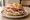 Panino con Guanciale: an illustration of pork on kaiser roll.