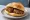 Panino con Mondeghili: an illustration of beef, pork and mortadella on bread.