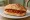 Panino con 'Nduja: an illustration of 'nduja, pork and pepper on bread.