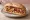 Panino con Panzanella: an illustration of tomato, cucumber, onion, basil and more.