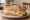 Panino con Pecorino e Pere: an illustration of parmesan and pear.