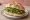 Panino con Pesto e Fagiolini: an illustration of pesto on kaiser roll.