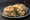 Panino con Pizzoccheri: an illustration of cabbage, potato, butter and cheese on kaiser roll.