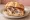 Panino con Porchetta di Ariccia: an illustration of pork, garlic, rosemary and pepper.