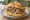 Panino con Quarume: an illustration of pepper and parsley on kaiser roll.