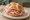 Panino con Rosetta: an illustration of pork and pepper on kaiser roll.