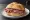 Panino con Salame di Varzi: an illustration of salami, pork, pepper and garlic on kaiser roll.
