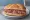 Panino con Salame Sant'Angelo: an illustration of salami, pork and pepper on bread.