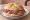 Panino con Soppressa Vicentina: an illustration of salami, pork, garlic and pepper on kaiser roll.