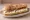 Panino con Stracciatella e Alici: an illustration of burrata, anchovy, olive oil and pepper on ciabatta.
