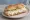 Panino con Stracciatella: an illustration of burrata, mozzarella, olive oil and pepper on ciabatta.