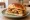 Panino con Strudel di Mele (Apfelstrudel): an illustration of apple, raisins and butter on brioche.