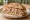 Panino con Tonno e Fagioli: an illustration of tuna, beans, olive oil and onion on bread.