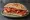 Panino con Ventricina: an illustration of pork, salami and pepper on bread.