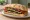 Panino con Verdure Grigliate: an illustration of eggplant, pepper and olive oil on ciabatta.