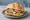 Panino Farcito: an illustration of pork on kaiser roll.