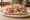 Panino Friulano: an illustration of prosciutto and pork on bread.