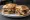 Panino Gourmet Contemporaneo: an illustration of pork on ciabatta.