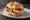Panino Romano: an illustration of pork on kaiser roll.