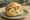 Pannfisch Brötchen: an illustration of fish, mustard and potato on kaiser roll.