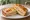 Paris Baguette — Croque Monsieur: an illustration of ham, cheese and béchamel on white bread.