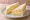 Paris Baguette — Egg Salad Sandwich: an illustration of egg and mayonnaise on white bread.