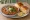 Pav Bhaji Classic: an illustration of potato, tomato, bell pepper, butter and more on bread.