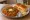 Pav Bhaji: an illustration of potato, tomato, bell pepper, butter and more on bread.