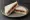 PB&J (Cultural Icon): an illustration of peanut butter and jam on white bread.