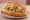 Peacemaker: an illustration of oyster, lettuce, tomato and mayonnaise on baguette.