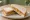 Peanut Butter and Honey: an illustration of peanut butter, honey and butter on white bread.