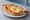 Peinirli me Avgo: an illustration of egg and cheese.