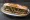 Pepito con Pimientos: an illustration of beef and pepper on baguette.