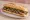 Pepito de Res: an illustration of beef on baguette.