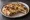 Peshawari Naan: an illustration of raisins on naan.