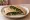 Piadina con Erbe di Campo: an illustration of garlic and olive oil.