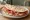 Piadina con Prosciutto Crudo: an illustration of the sandwich.