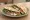 Piadina Farcita Mista: an illustration of prosciutto, ham and cheese.