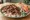 Pilav Üstü Döner: an illustration of rice, beef, lamb, onion and more on bread.