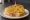 Pincho de Tortilla: an illustration of egg, potato, onion and olive oil on baguette.