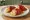 Pintxo de Pimiento Relleno: an illustration of pepper, cod and olive oil on baguette.
