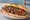 Pirzola Ekmek: an illustration of lamb on bread.