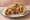 Pollo Asado Burrito: an illustration of chicken, rice, beans, salsa and more on tortilla.