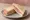 Polony Sandwich: an illustration of pork and butter on white bread.