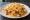 Ponyshoe: an illustration of beef, potato and cheese sauce on white bread.